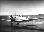 Instructor Robert T Ahern AT-6 #201 Takeoff Piloted by Lou Place by Robert T. Ahern